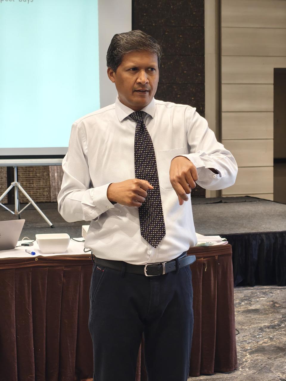 Dinesh Gosai delivering a corporate training session